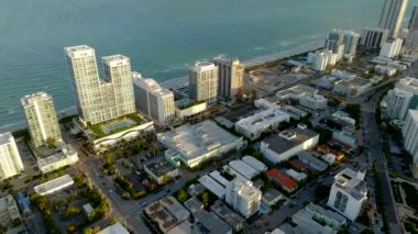 Elevated shot facing down Miami Beach sunset and ocean