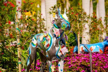 Miami, FL, USA - February 19, 2023: Photo of Dogs and Cats art sculptures in Miami at Maurice A Ferre Park