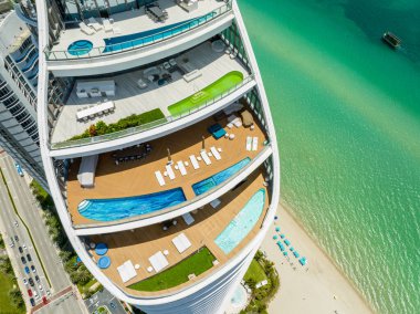 Sunny Isles Beach, FL, USA - June 14, 2023: Aerial photo The Ritz Carlton Residences clipart