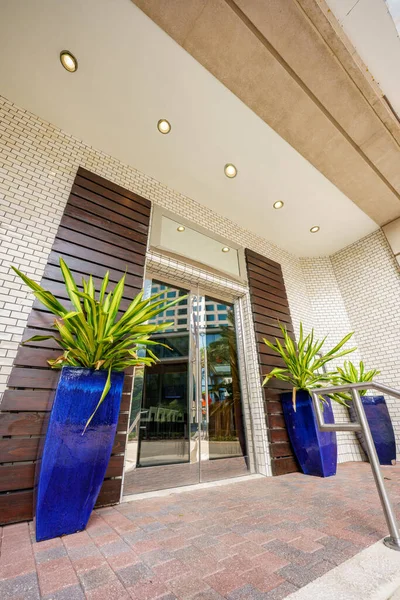 Luxury stainless steel bank building office entrance doors with planters