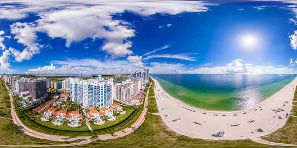 Aerial 360 drone panorama Miami Beach oceanfront condominiums on a beautiful day equirectangular vr