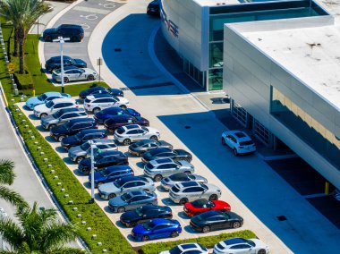 Davie, FL, USA - October 15, 2023: Aerial drone photo Porsche West Broward a luxury automotive dealer clipart