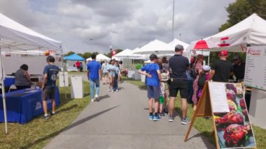 Weston, FL, ABD - 3 Mart 2024: Slow motion stock video Weston World Fest 2024