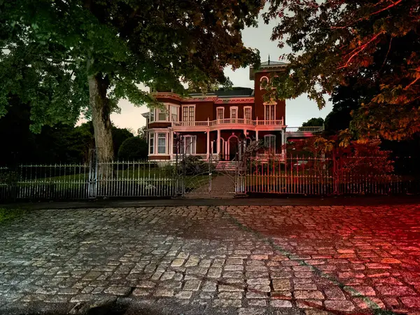 stock image Bangor, Maine, USA - June 29, 2024: Night photo of Stephen Kings House