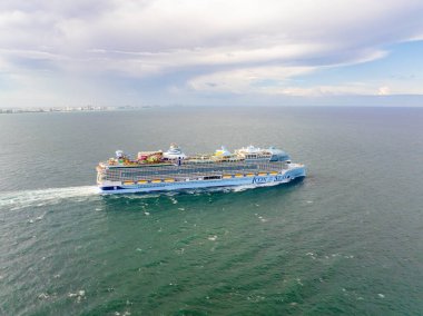 Miami, FL, USA - August 31, 2024: Aerial photo Icon of the Seas Royal Caribbean cruiseship departing Miami clipart