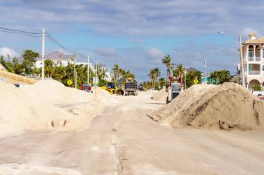 Storm surge sand filled roads on Bonita Beach Florida aftermath Hurricane Milton clipart