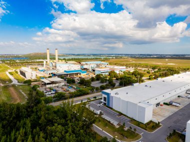 Aerial photo Doral warehouses by landfill incinerator clipart