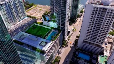 Miami, FL, USA - September 30, 2025: Aerial view of Brickell House Condominium from west side. Drone stock video of Miami scenes