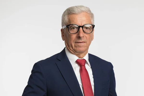 Old Businessman Wearing Navy Suit Red Tie Eyeglasses While Looking — Stock Photo, Image
