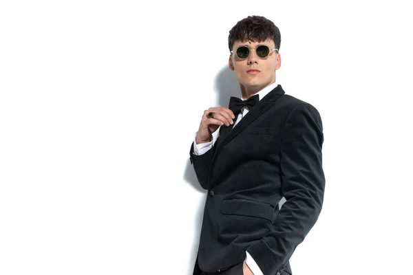 Sexy Businessman Wearing Black Tuxedo Ring Sunglasses Putting One Hand — стоковое фото