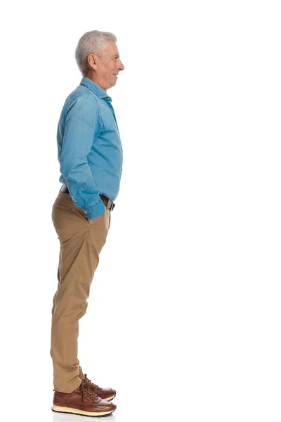 Handsome Man Denim Shirt Holding Hands Chino Pants Pockets Standing — Stock Photo, Image