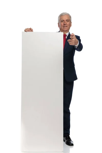 Full Body Picture Old Businessman Pointing Camera Holding Blank Billboard — Stockfoto