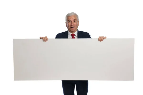 Old Businessman Feeling Shocked Holding White Billboard — Foto Stock
