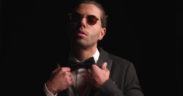 Project Video Elegant Man Arranging Tuxedo Bowtie Wearing Sunglasses Posing — Video Stock