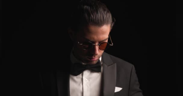 Sexy Turkish Man Wearing Elegant Black Tuxedo Arranging Bowtie Smiling — Stok video