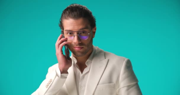 Happy Man White Suit Answering Telephone Talking Phone Pointing Fingers — Stockvideo