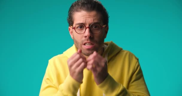 Scared Casual Man Glasses Biting His Fingers Holding His Face — Stok video