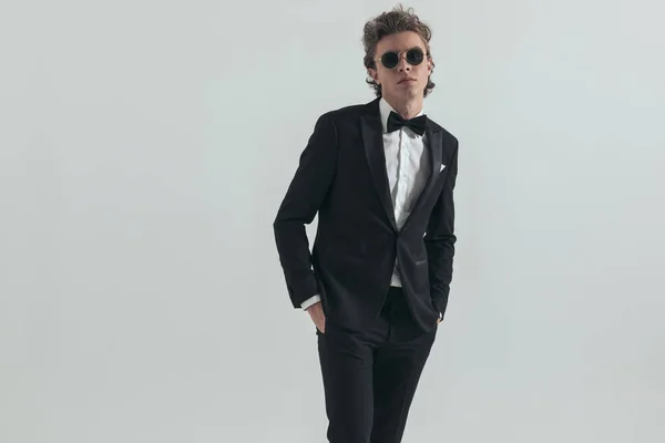 Cool Elegant Businessman Wearing Black Tuxedo Sunglasses Posing Hands Pockets — Stock fotografie