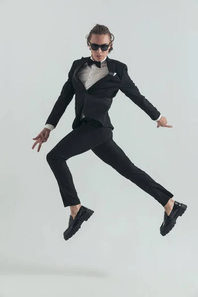 Elegant Man Tuxedo Jumping Air Dynamic Way Posing Fashion Manner — Stock Photo, Image