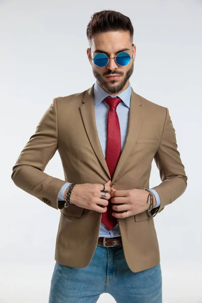 Portrait Handsome Businessman Closing His Jacket Standing Wearing Sunglasses Gray — Foto de Stock