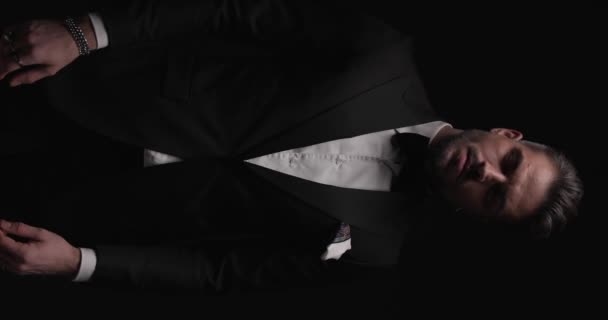Elegant Young Man Adjusting Buttoning Tuxedo Crossing Arms Posing Dark — 비디오