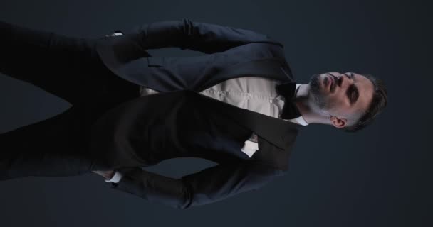Sexy Bearded Man Wearing Black Tuxedo Bowtie Looking Side Standing — 图库视频影像