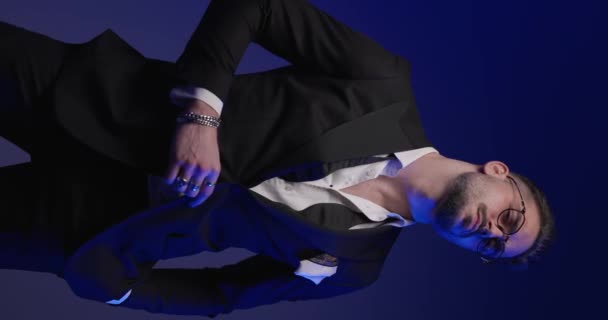 Cool Fashion Man Undone Bowtie Adjusting Tuxedo Looking Side Holding — Αρχείο Βίντεο