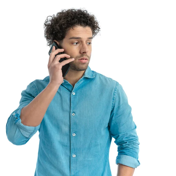 Portrait Attractive Turkish Man Talking Phone Looking Side Front White — Zdjęcie stockowe