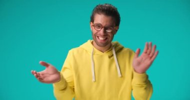 casual man clapping hands for you and feeling excited