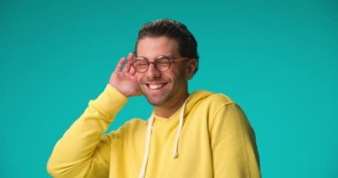 casual man listening all the latest gossips and having a good time