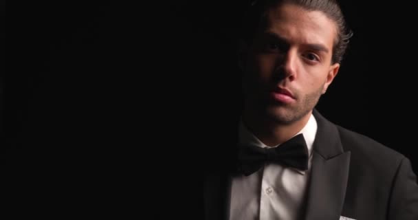 Sexy Businessman Arranging His Jacket Bowtie Gesturing You Come — Stok video