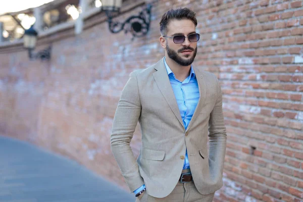 Portrait Sexy Bearded Businessman Looking Away Holding Hands Pockets Front — Stock fotografie