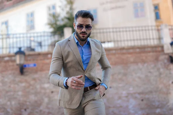 Sexy Unshaved Man Sunglasses Walking Hand Pocket Outdoor Old City — Stockfoto