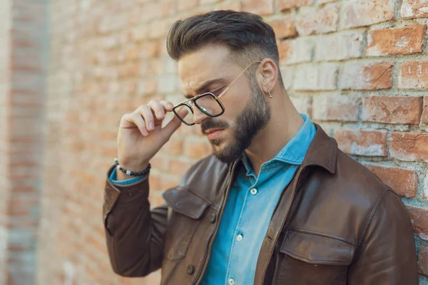 Portrait Handsome Casual Man Arranging Eyeglasses Looking Wearing Leather Jacket — Stock Photo, Image