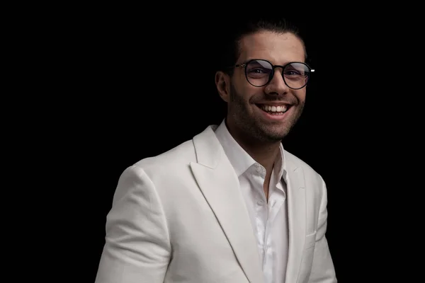 Enthusiastic Elegant Man Glasses White Suit Laughing Front Black Background — Stock Photo, Image