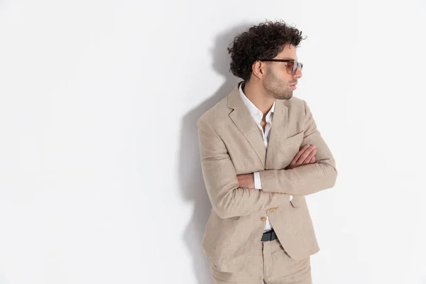 Sexy Fashion Man Curly Hair Folding Arms Looking Side While — Stock Photo, Image