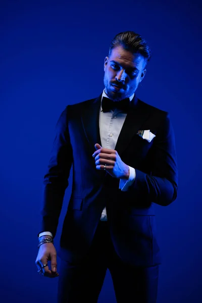 Sexy Bearded Businessman Suit Posing Arms Fashion Pose Blue Lights — стоковое фото