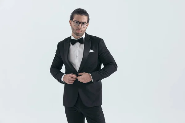 Attractive Elegant Man Glasses Closing Buttoning Black Tuxedo Front Grey — Stock Photo, Image