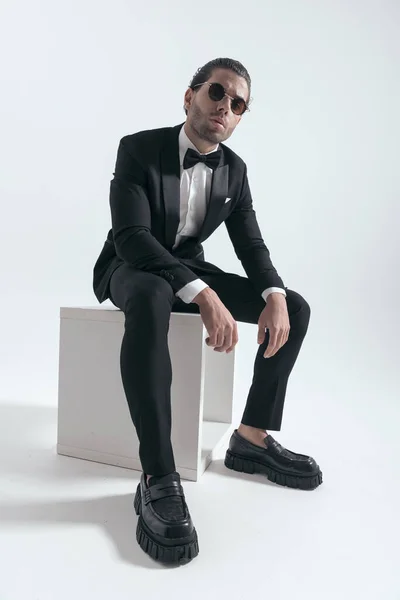 Confident Elegant Man Sunglasses Sitting Arms Knees Posing Cool Way — Stock Photo, Image
