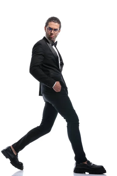 Young Businessman Stepping Wide Hands Pockets Mad Face Wearing Glasses — Stock Photo, Image