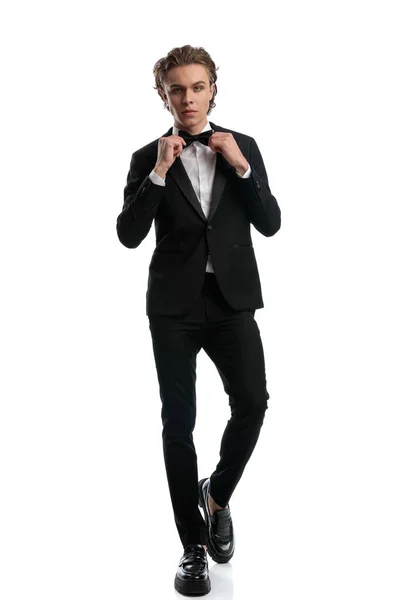 Elegant Businessman Arranging His Bowtie Walking Camera Wearing Formal Outfit — Stock Photo, Image