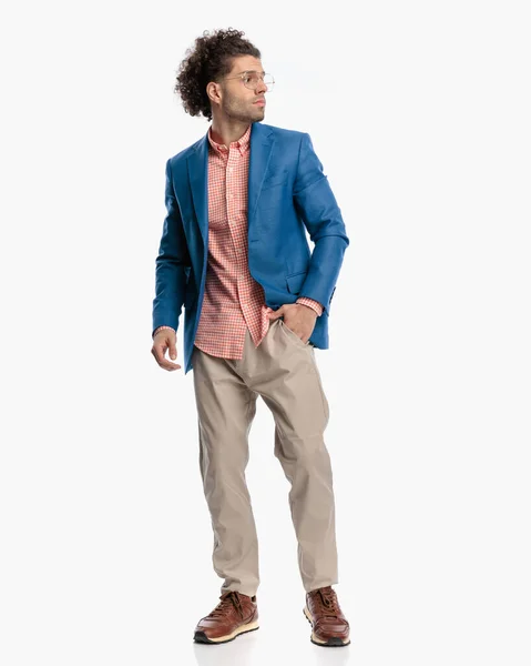 Casual Man Curly Hair Wearing Blue Jacket Holding Hands Pockets — Stock Photo, Image