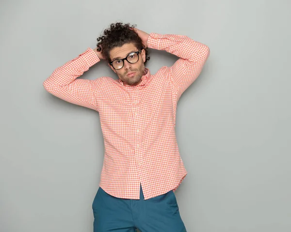 Cool Young Man Curly Hair Wearing Glasses Posing Hands Hair — Stock Photo, Image