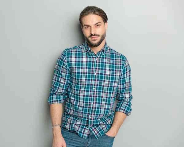 Confident Casual Man Wearing Checkered Shirt Holding Hand Pockets Posing — Stock Photo, Image