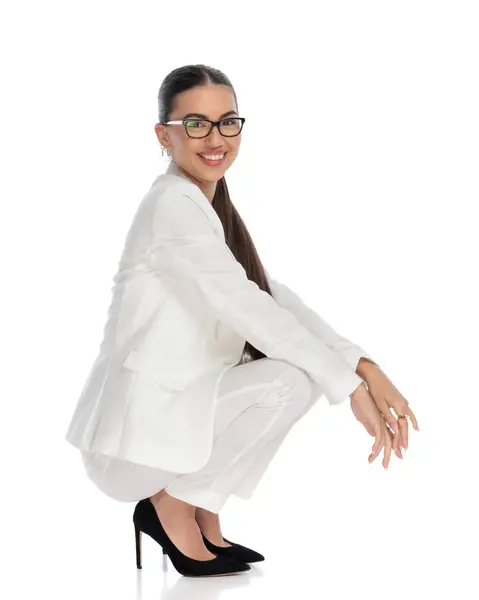 Side View Picture Happy Elegant Girl Glasses Crouching Elbows Knees — Stock Photo, Image