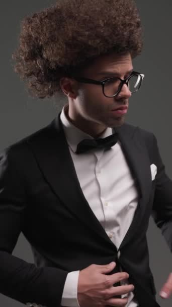 Sexy Elegant Groom Glasses Looking Side Adjusting Black Tuxedo Holding — Stock Video