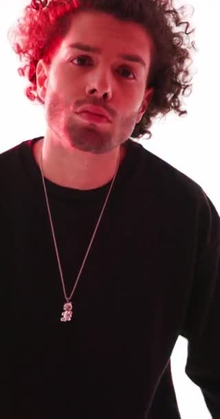 Vertical Video Arrogant Sexy Man Curly Hair Black Hoodie Looking — Stock Video