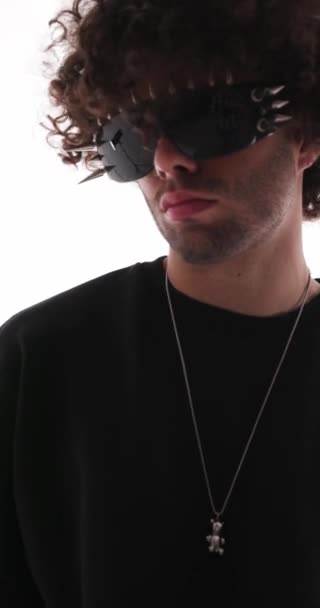 Cool Fashion Guy Black Sweatshirt Curly Hair Wearing Spiked Sunglasses — Stock Video
