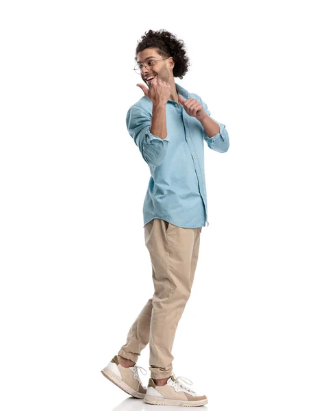 Side View Joyful Young Casual Man Pointing While Moving White — Stock Photo, Image