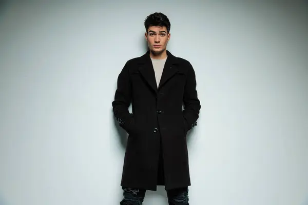 Portrait Confident Fashion Man Black Coat Holding Hands Pockets Looking — Stock Photo, Image